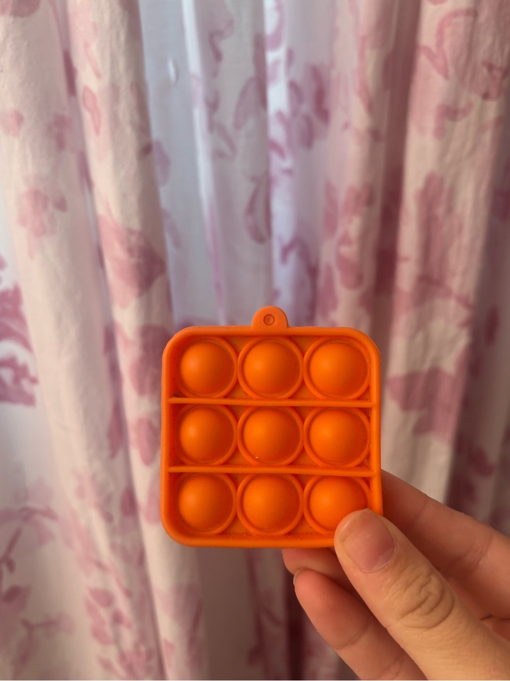Orange mini pop it fidget toy NWOT